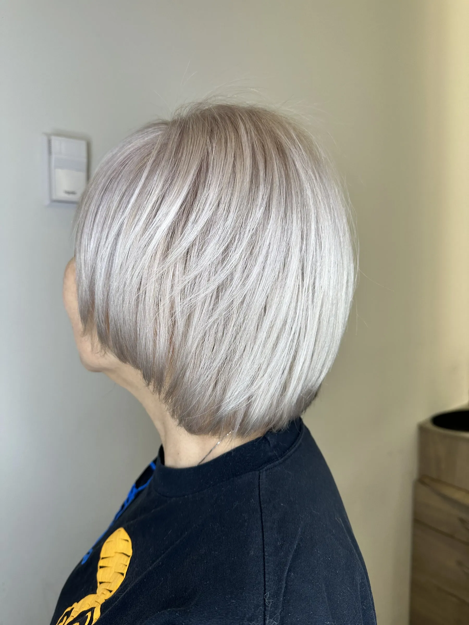 Bright icy silver blonde bob by Ronak Hairstylist in Toronto