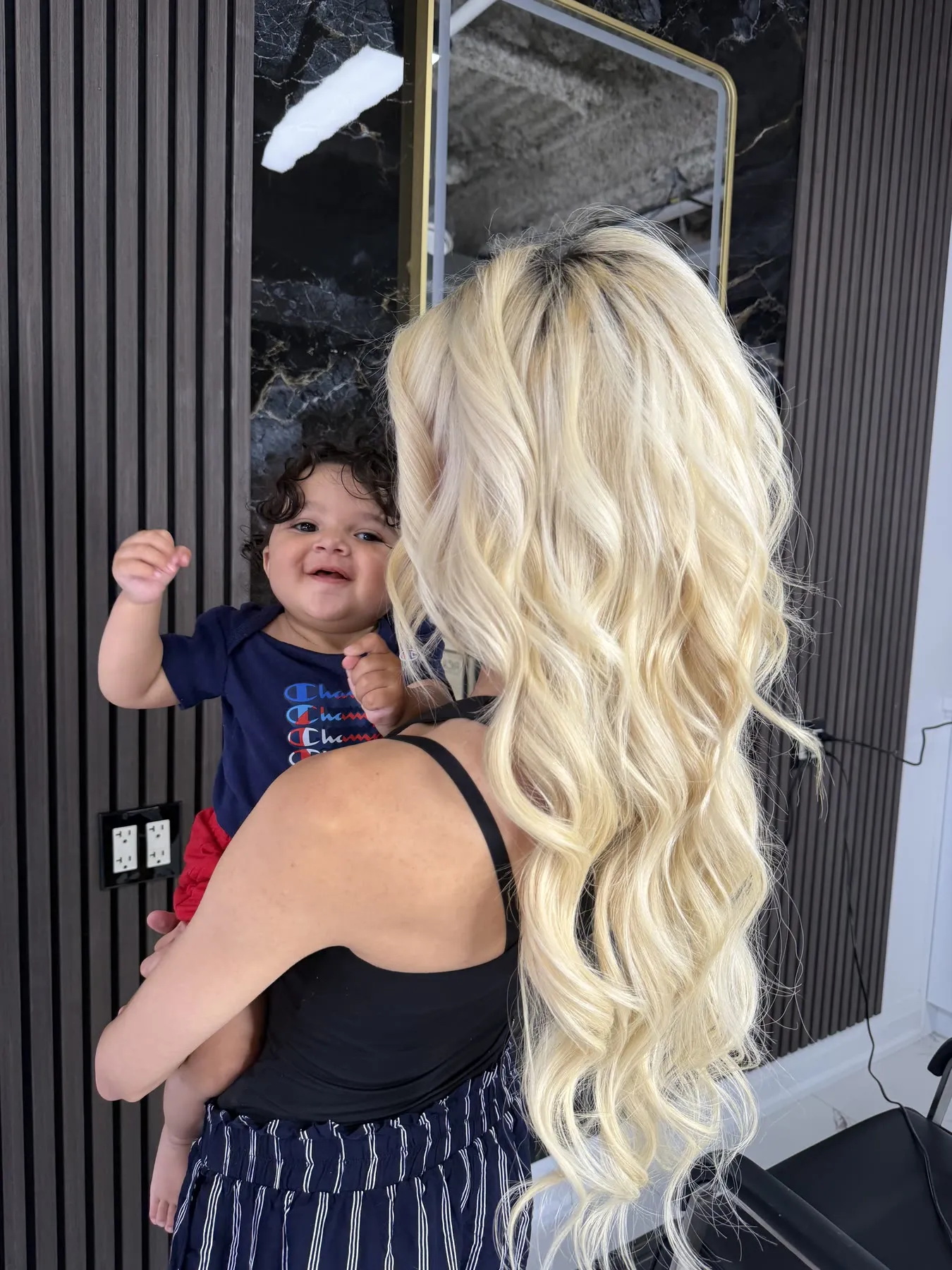 Platinum blonde waves by Ronak Hairstylist in Toronto