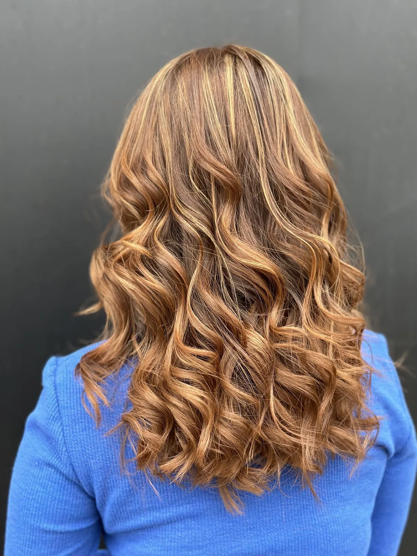 Copper ginger waves by Ronak Hairstylist in Toronto
