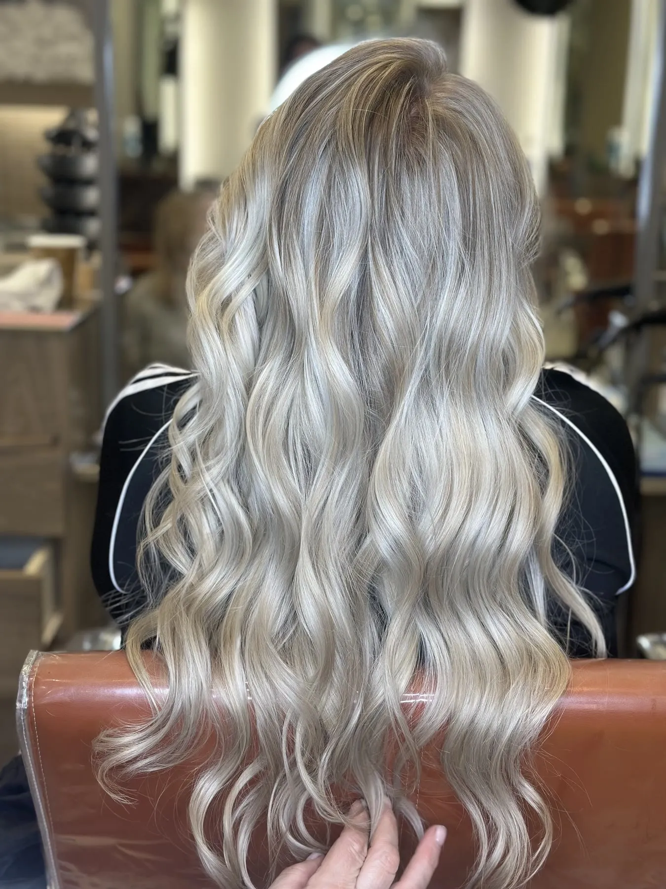 Silver ash blonde waves by Ronak Hairstylist in Toronto